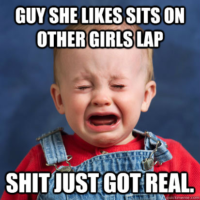 Guy she likes sits on other girls lap Shit just got real.  scary face