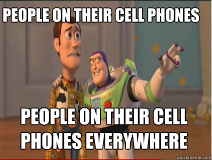 people on their cell phones people on their cell phones everywhere  woody and buzz