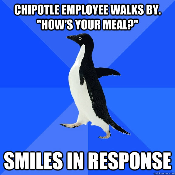 Chipotle employee walks by. 