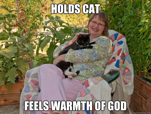 Holds cat Feels warmth of god  cat lady