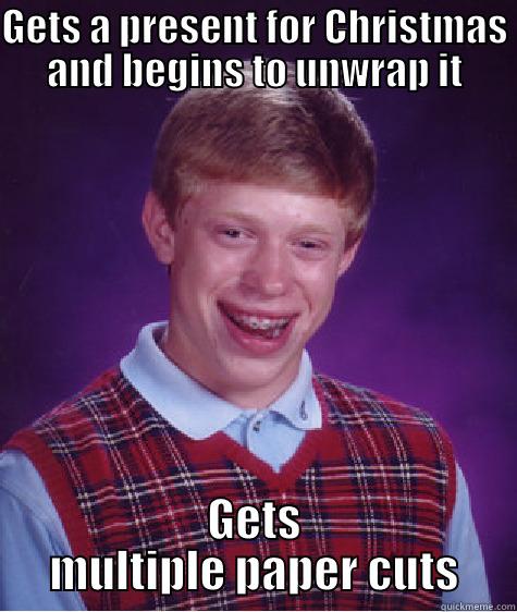 GETS A PRESENT FOR CHRISTMAS AND BEGINS TO UNWRAP IT GETS MULTIPLE PAPER CUTS Bad Luck Brian