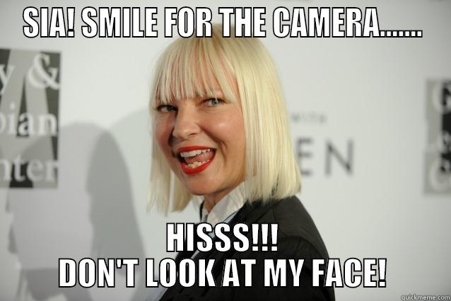 SIA! SMILE FOR THE CAMERA....... HISSS!!! DON'T LOOK AT MY FACE! Misc