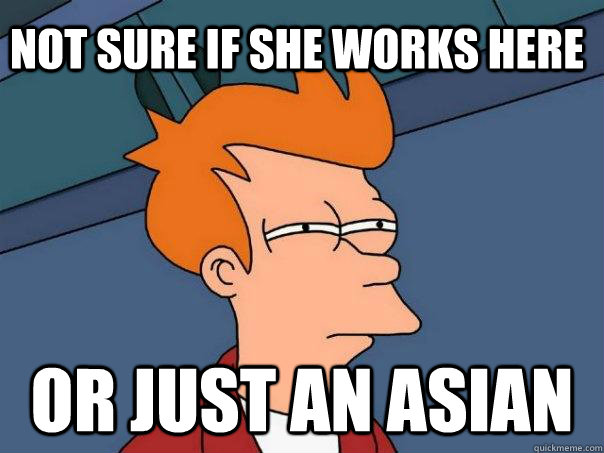Not sure if she works here Or just an Asian  Futurama Fry