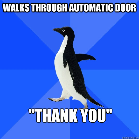 Walks through automatic door 