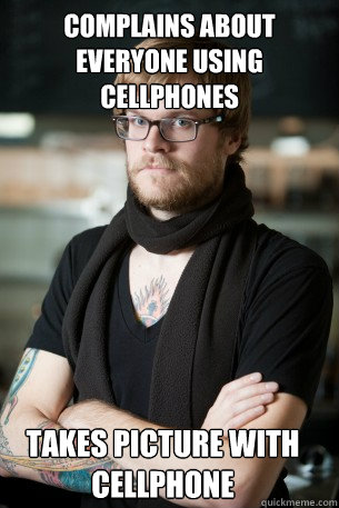 Complains about everyone using cellphones  Takes picture with cellphone  Hipster Barista