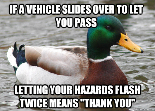 If a vehicle slides over to let you pass Letting your hazards flash twice means 