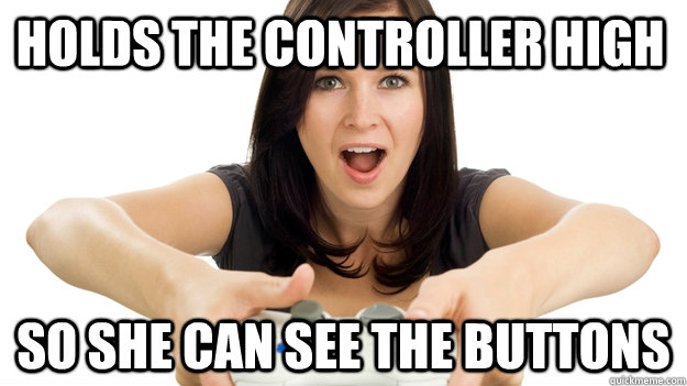 Holds the controller high So she can see the buttons  Poser Gamer Girl