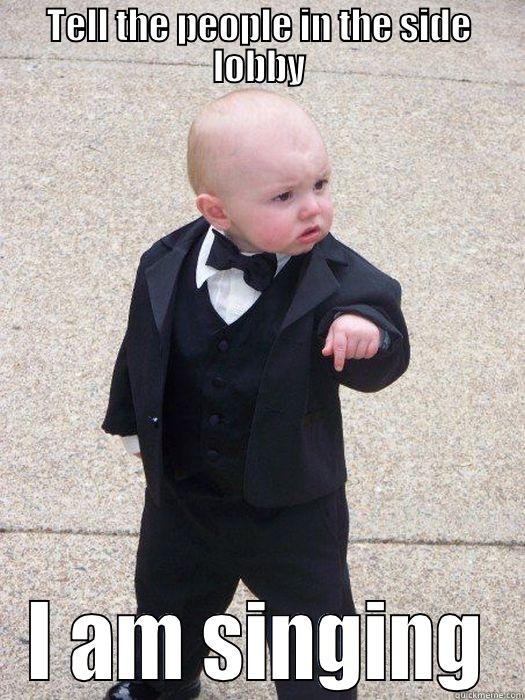 TELL THE PEOPLE IN THE SIDE LOBBY I AM SINGING Baby Godfather