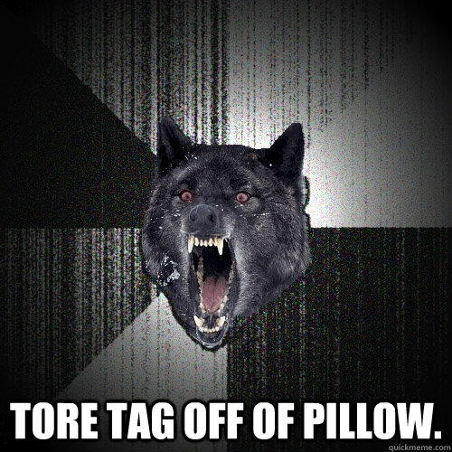  Tore tag off of pillow.  Insanity Wolf