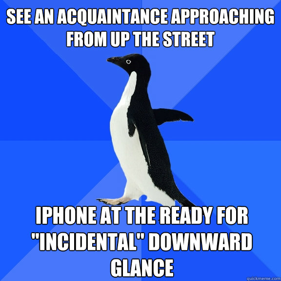 see an acquaintance approaching from up the street iphone at the ready for 