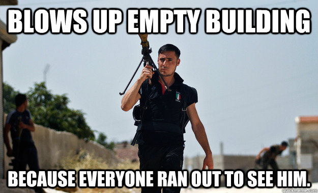 Blows up empty building because everyone ran out to see him.  Ridiculously Photogenic Syrian Rebel Fighter