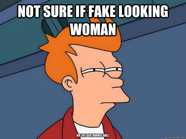 Not sure if fake looking woman or life size Barbie doll.  Futurama Fry