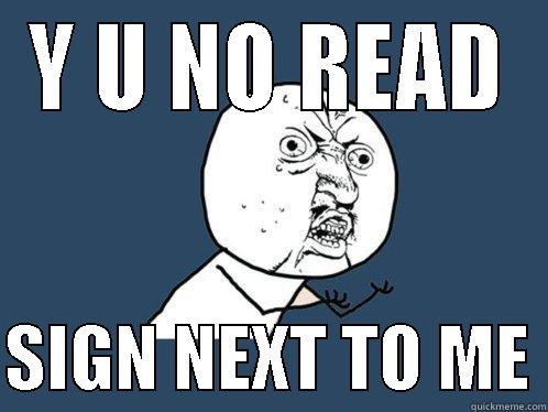 Y U NO READ  SIGN NEXT TO ME Y U No