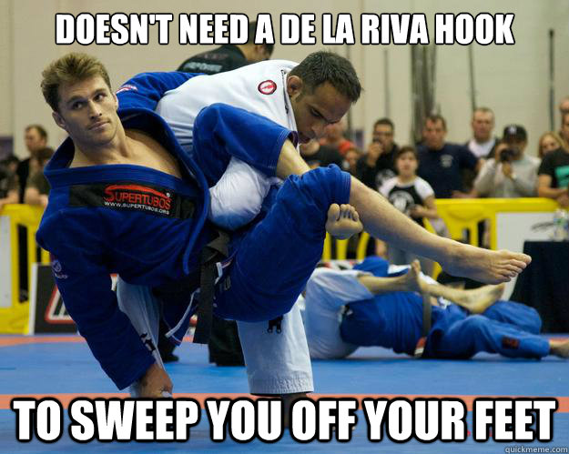 Doesn't need a De La Riva hook To sweep you off your feet  Ridiculously Photogenic Jiu Jitsu Guy