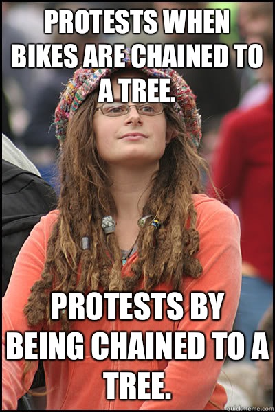 Protests when bikes are chained to a tree.  Protests by being chained to a tree.   Bad Argument Hippie