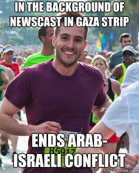 In the background of
Newscast in gaza strip ends arab-
Israeli conflict  Ridiculously photogenic guy