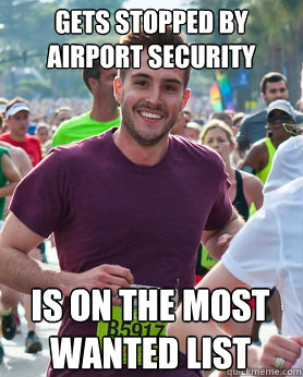gets stopped by airport security Is on the Most wanted list  Ridiculously photogenic guy