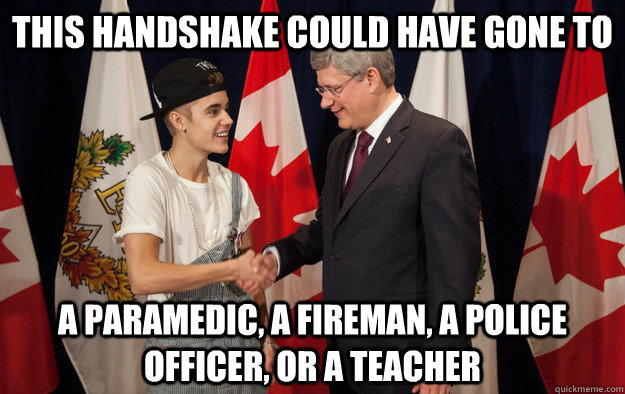 This handshake could have gone to a paramedic, a fireman, a police officer, or a teacher - This handshake could have gone to a paramedic, a fireman, a police officer, or a teacher  Misc