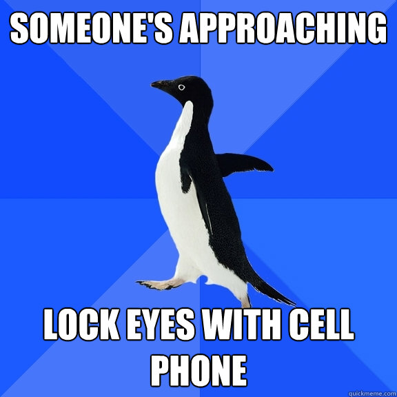 someone's approaching lock eyes with cell phone  Socially Awkward Penguin