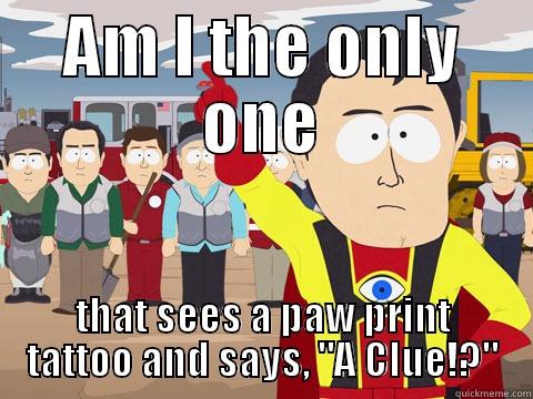 AM I THE ONLY ONE THAT SEES A PAW PRINT TATTOO AND SAYS, 