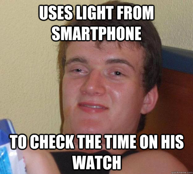 Uses light from smartphone To check the time on his watch - Uses light from smartphone To check the time on his watch  10 Guy