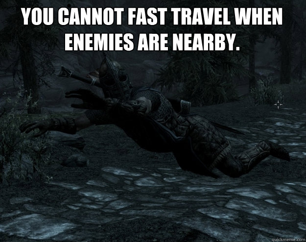 you cannot fast travel when enemies are nearby.  