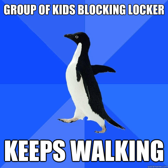 Group of kids blocking locker Keeps walking  