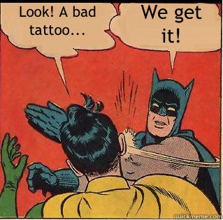 Look! A bad tattoo... We get it!  Slappin Batman
