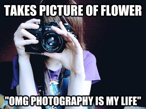 takes picture of flower 