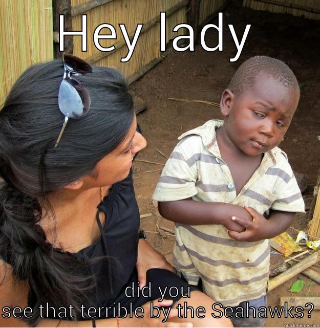 HEY LADY DID YOU SEE THAT TERRIBLE BY THE SEAHAWKS? Skeptical Third World Kid