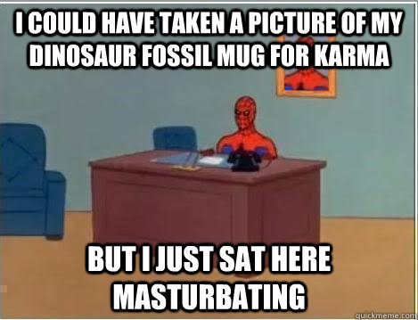I could have taken a picture of my dinosaur fossil mug for karma but I just sat here masturbating  Spiderman Desk