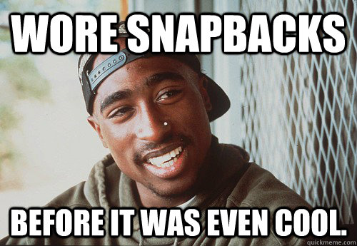 Wore snapbacks before it was even cool.  SuperPac Shakur