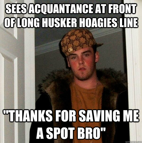 Sees acquantance at front of long Husker Hoagies line 