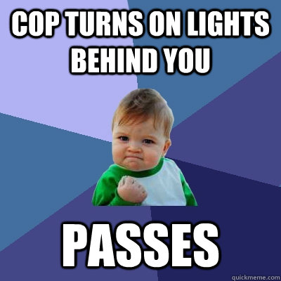 cop turns on lights behind you passes  Success Kid