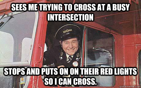 Sees me trying to cross at a busy intersection Stops and puts on on their red lights so I can cross. - Sees me trying to cross at a busy intersection Stops and puts on on their red lights so I can cross.  Good Guy Bus Driver