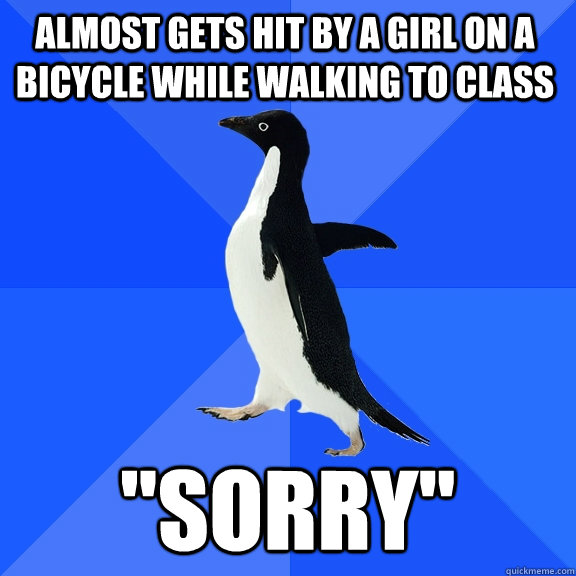 almost gets hit by a girl on a bicycle while walking to class 