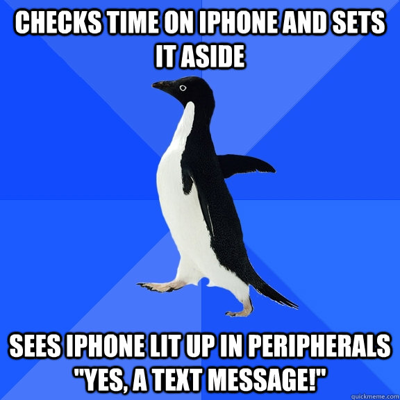 checks time on iPhone and sets it aside sees iphone lit up in peripherals 