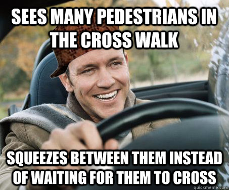 sees many pedestrians in the cross walk squeezes between them instead of waiting for them to cross  SCUMBAG DRIVER
