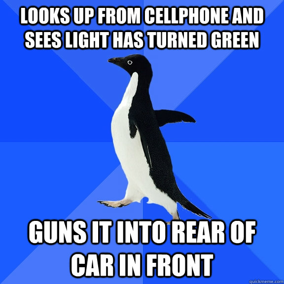 looks up from cellphone and sees light has turned green guns it into rear of car in front   Socially Awkward Penguin