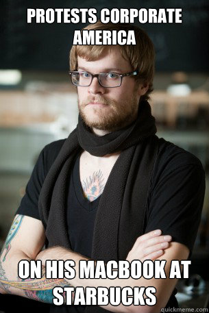 protests corporate america on his macbook at starbucks  Hipster Barista