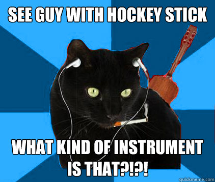 See guy with hockey stick what kind of instrument is that?!?!   Socially Awkward Berklee Cat