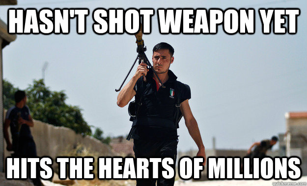 Hasn't shot weapon yet Hits the hearts of millions  Ridiculously Photogenic Syrian Rebel Fighter