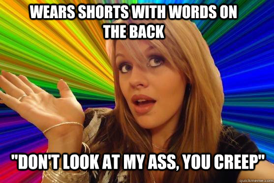 wears shorts with words on the back 