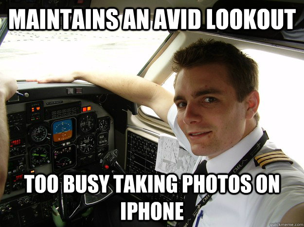Maintains an avid lookout too busy taking photos on iphone - Maintains an avid lookout too busy taking photos on iphone  oblivious regional pilot