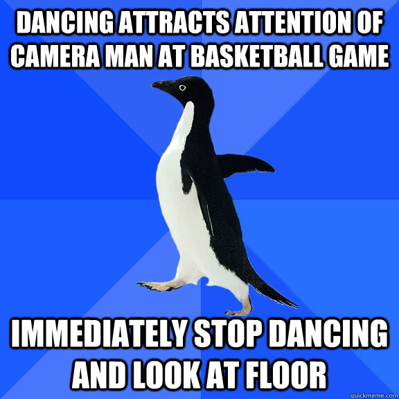 Dancing attracts attention of camera man at basketball game immediately stop dancing and look at floor  Socially Awkward Penguin