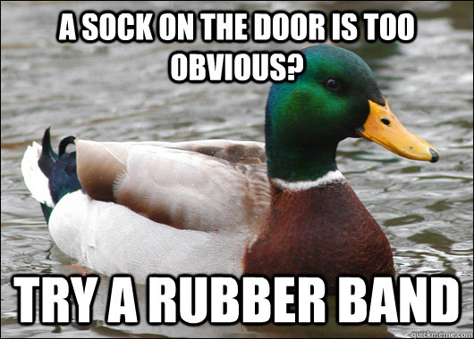 a sock on the door is too obvious? Try a rubber band  Actual Advice Mallard