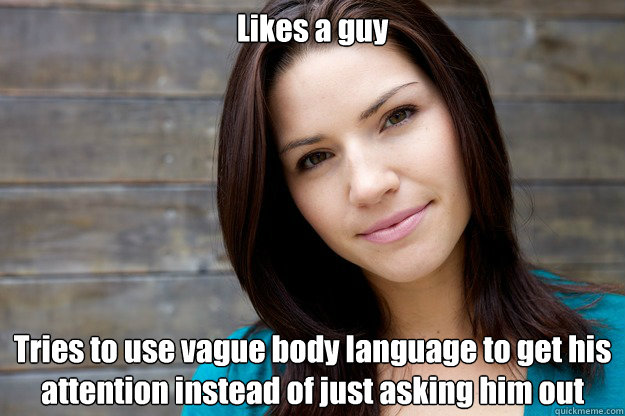 Likes a guy Tries to use vague body language to get his attention