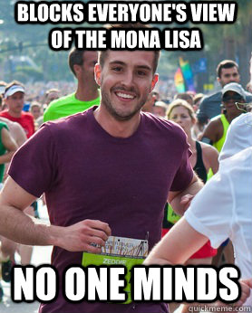 blocks everyone's view of the mona lisa no one minds  Ridiculously photogenic guy