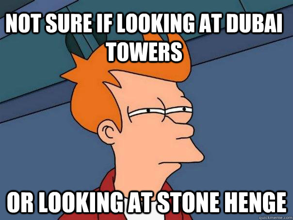 Not sure if looking at Dubai Towers Or looking at Stone Henge  Futurama Fry