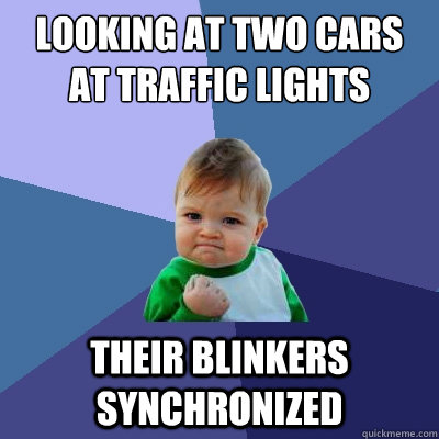 Looking at two cars at traffic lights their blinkers synchronized  Success Kid